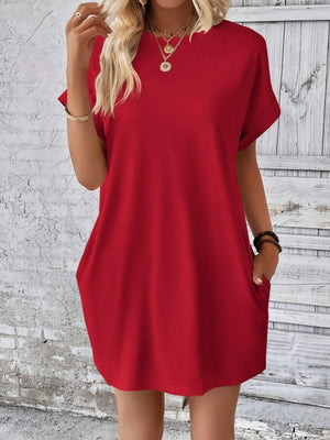 Relaxed tee dress in deep red with cuffed sleeves and side pockets.
