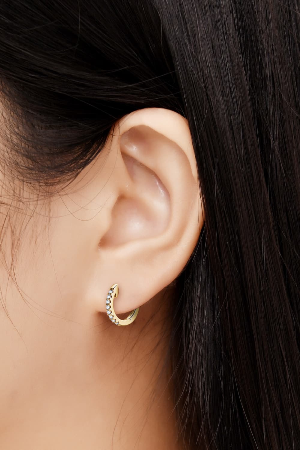 Gold pavé hoop earrings with clear stones, 18K gold-plated sterling silver.