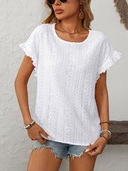 White eyelet knit blouse with ruffled short sleeves and a scoop neckline.