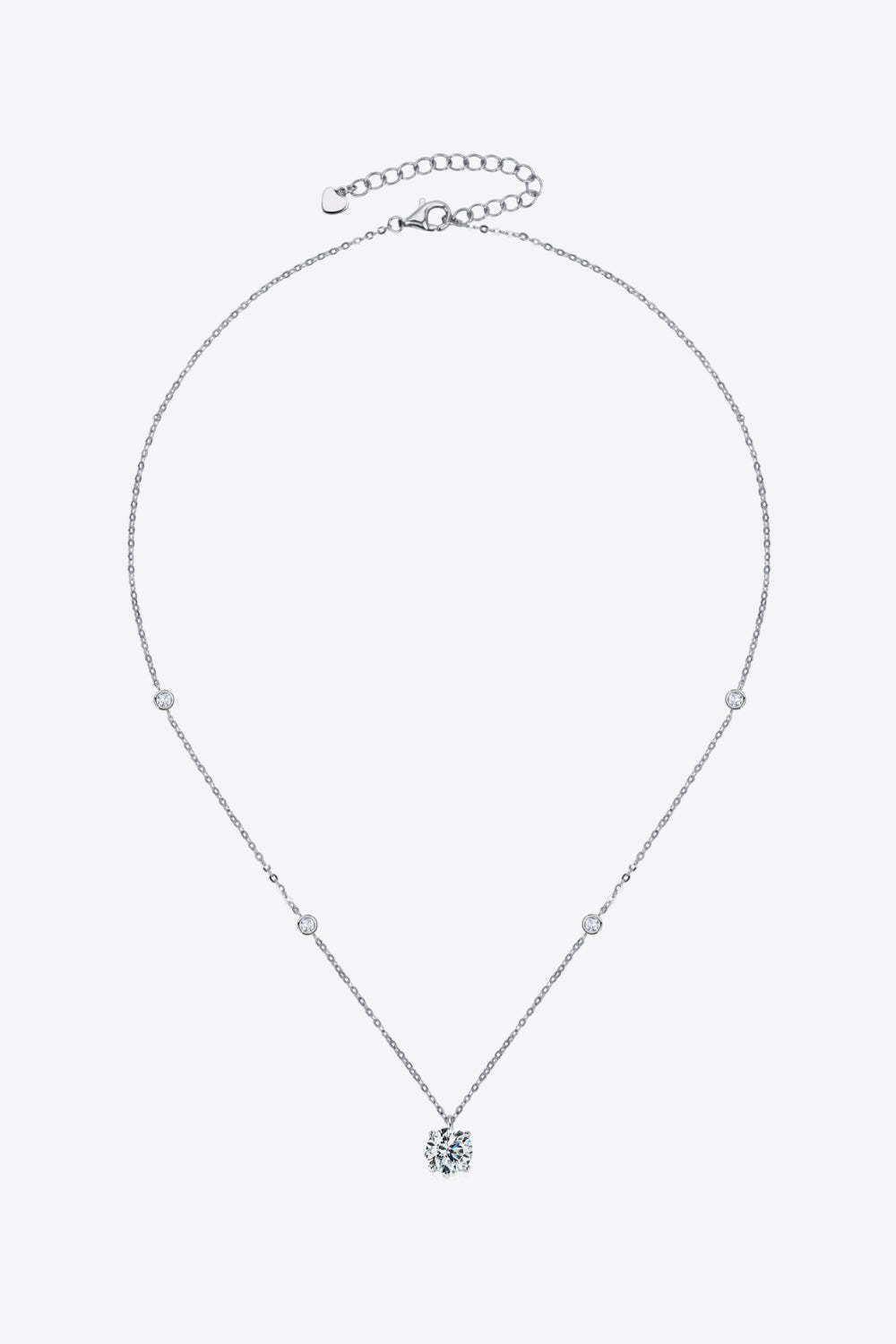 Silver solitaire necklace with scattered accent stones and adjustable chain