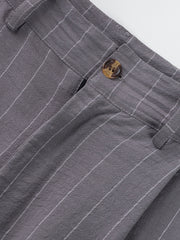 Grey striped men's sweatpants with a button closure and textured fabric.
