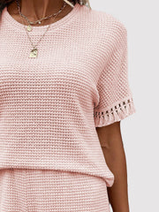 Blush pink waffle knit set with fringe trim on short sleeves.