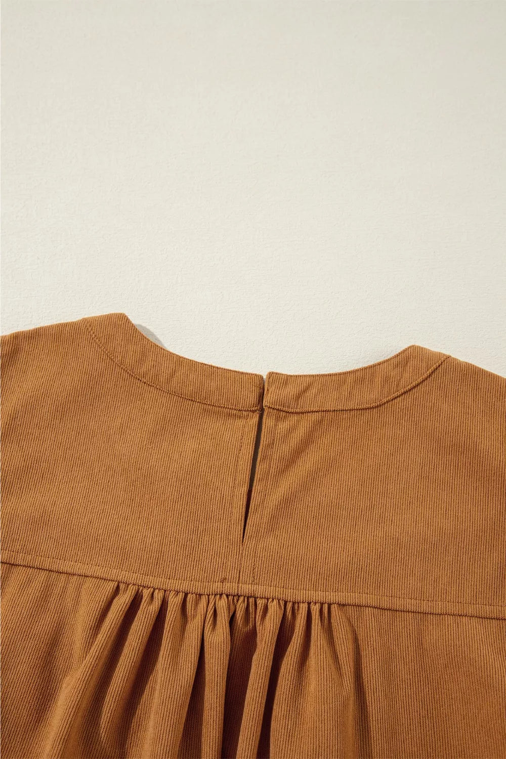 Caramel corduroy mini dress with puff sleeves and gathered waist detail