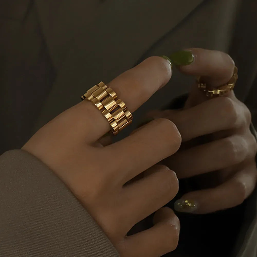 Gold watch link statement ring with adjustable band
