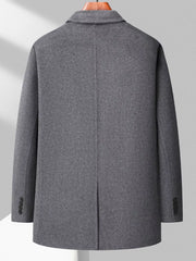 Men's gray wool long-sleeve overcoat with button cuffs and a center back vent.