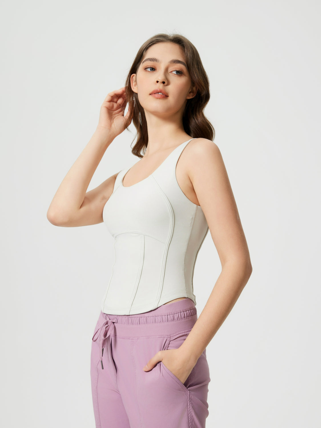White sculpted seam tank top with built-in support and scoop neckline