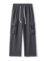 Dark Gray wide-leg cargo sweatpants with drawstring waist and multiple pockets.