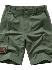 Military green chino shorts with elastic waist, button fly, and cargo pockets.