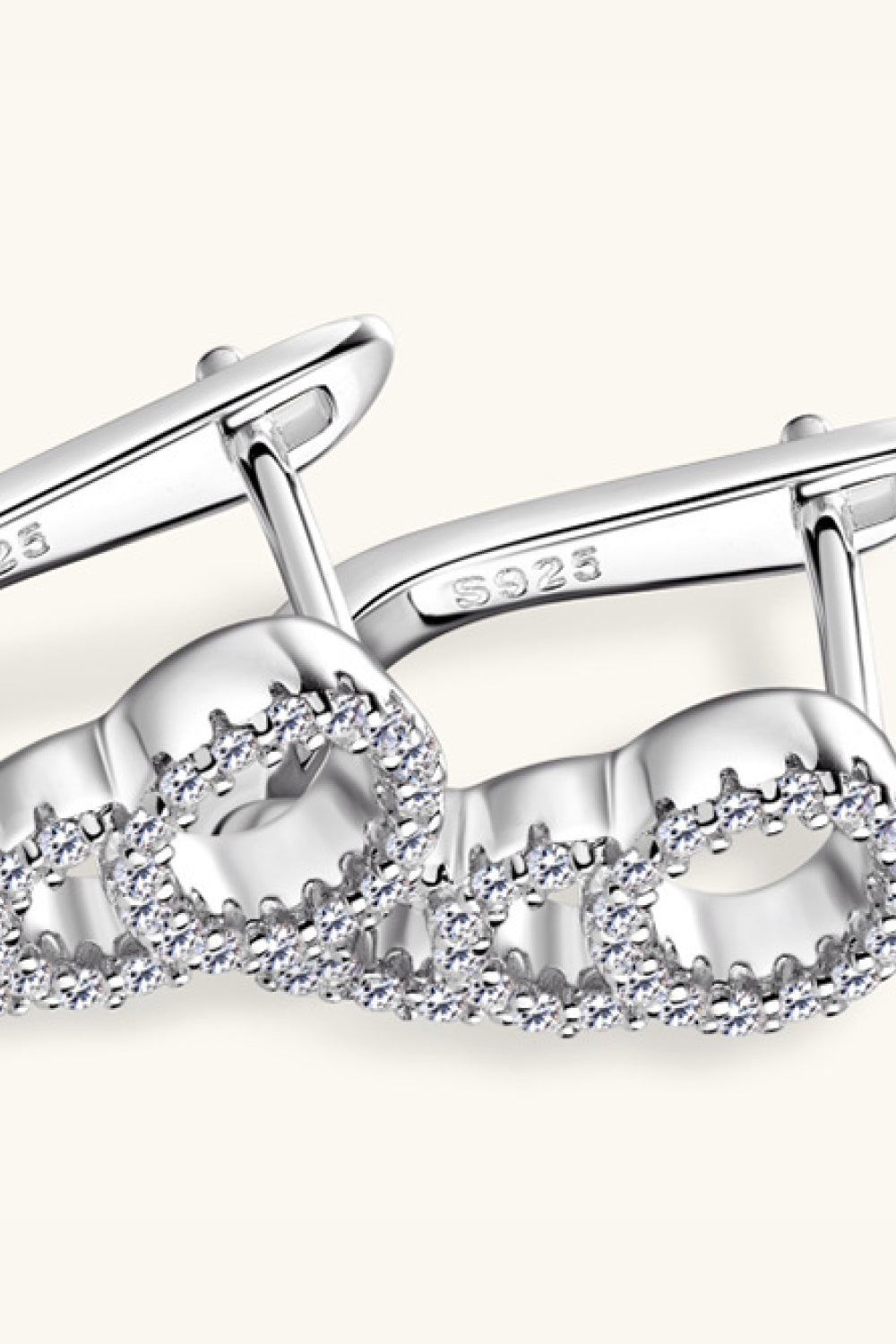 Silver pave hoop earrings with cascading infinity design and S925 stamp