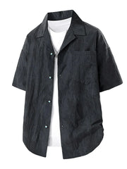 Black relaxed fit camp collar men's shirt with short sleeves and a chest pocket.