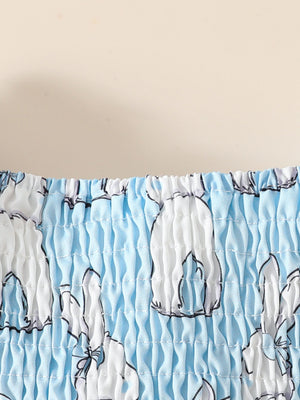 Baby dress with smocked bodice in sky blue with white bunny print