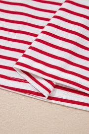 Maternity shirt with red and white stripes, cotton fabric, puff sleeve detail visible.