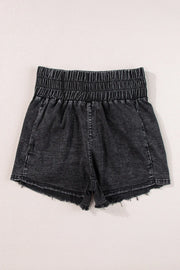 Black washed denim shorts with elastic smocked waist and frayed hem