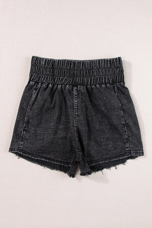 Black washed denim shorts with elastic smocked waist and frayed hem