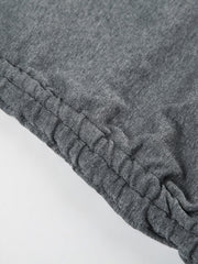 Ruched bodycon mini dress in grey jersey with adjustable drawstring detail.