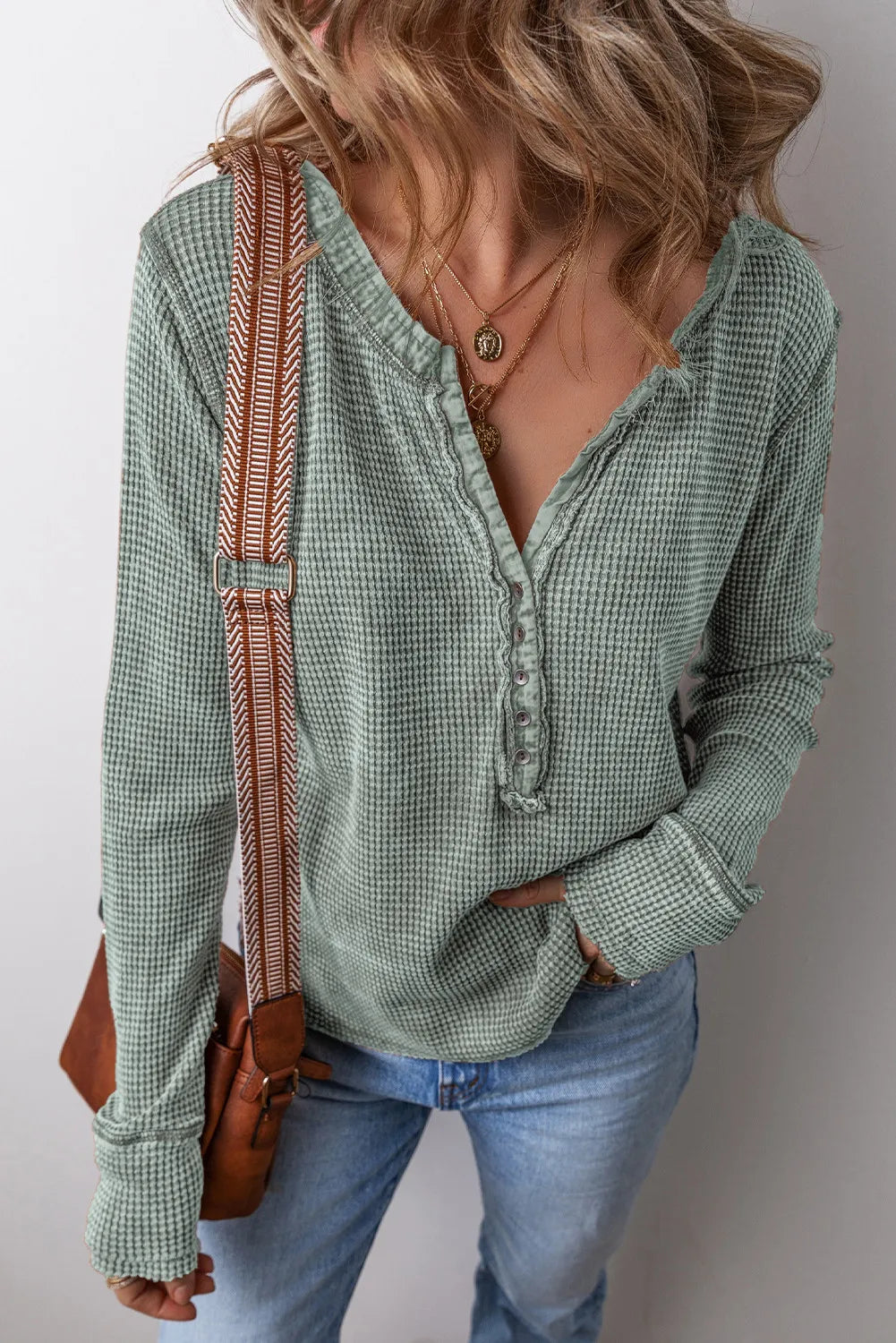 Sage waffle knit henley blouse with button detail and v-neck