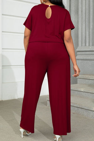 Keyhole back relaxed fit jumpsuit in wine with wide leg pants.