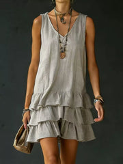 Grey tiered ruffled hem V-neck sleeveless mini dress with layered ruffles.