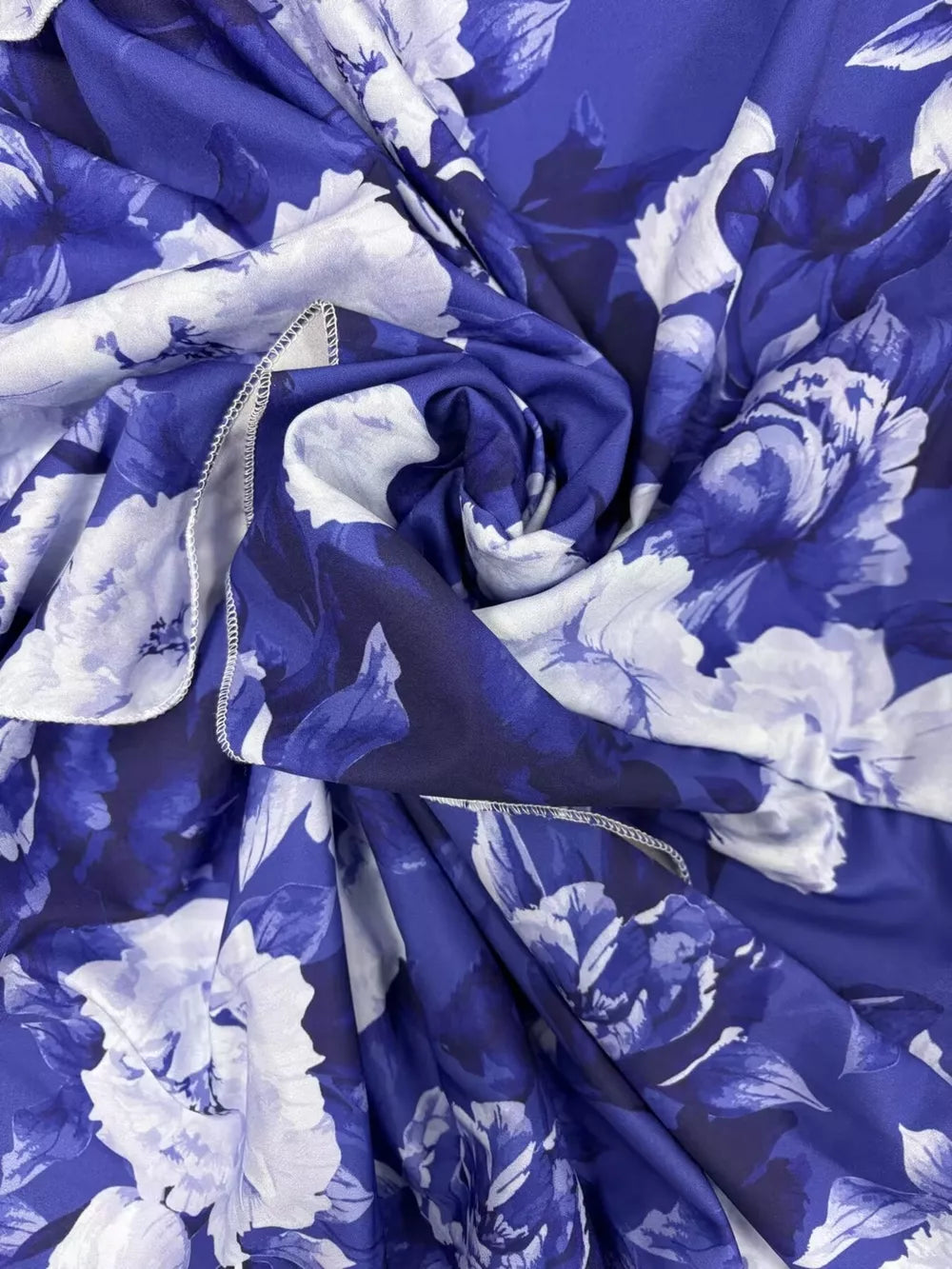 Ruffled floral two-piece set in Light Indigo polyester with white floral print.