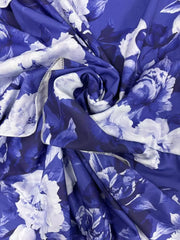 Ruffled floral two-piece set in Light Indigo polyester with white floral print.