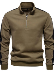 Quarter-zip sweatshirt in taupe with black side panels and a stand-up collar.