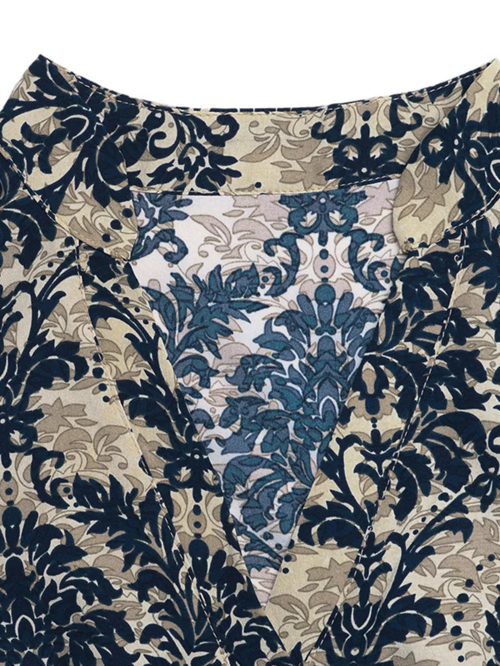 Maternity blouse with notch neckline and ornate floral print in navy, tan, and blue.