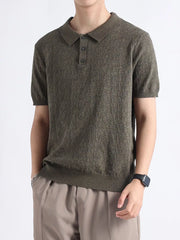 Moss green short-sleeve knit polo shirt with button detail and classic collar.