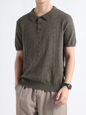 Moss green short-sleeve knit polo shirt with button detail and classic collar.