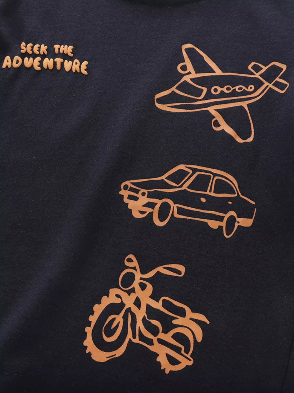 Navy toddler t-shirt with airplane, car, and motorcycle graphics and "Seek the Adventure" text.