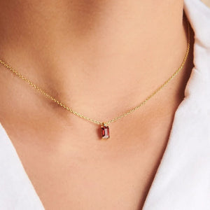 18K gold necklace with a rectangular red gemstone pendant