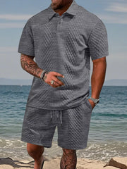 Gray textured knit polo shirt and drawstring shorts set for men.