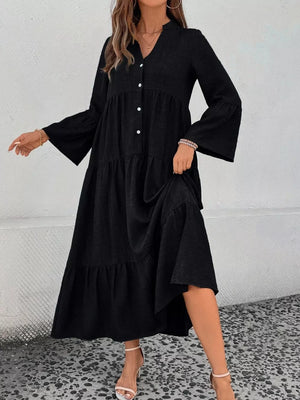 Black tiered ruffle hem V-neck dress with button front and bell sleeves.