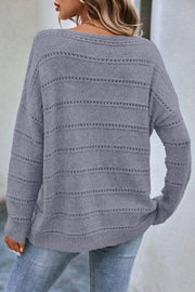 Gray openwork knit pullover sweater with horizontal stripe detail and boat neckline.