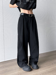 Men's black wide leg sweatpants with belt loops and pockets.