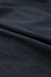 Black denim button-up shirt with frayed ruffle trim detail