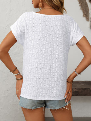 White eyelet knit tee with short sleeves and a scoop neck, featuring a diamond pattern.