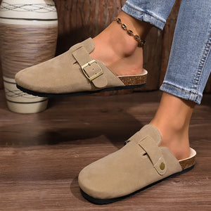 Suede buckle mules in mocha with cork sole detail.