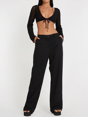 Black crochet tie-front bolero shrug with long sleeves and open knit detail.