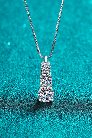 Silver moissanite cascade pendant with three round-cut stones on a sterling silver box chain.