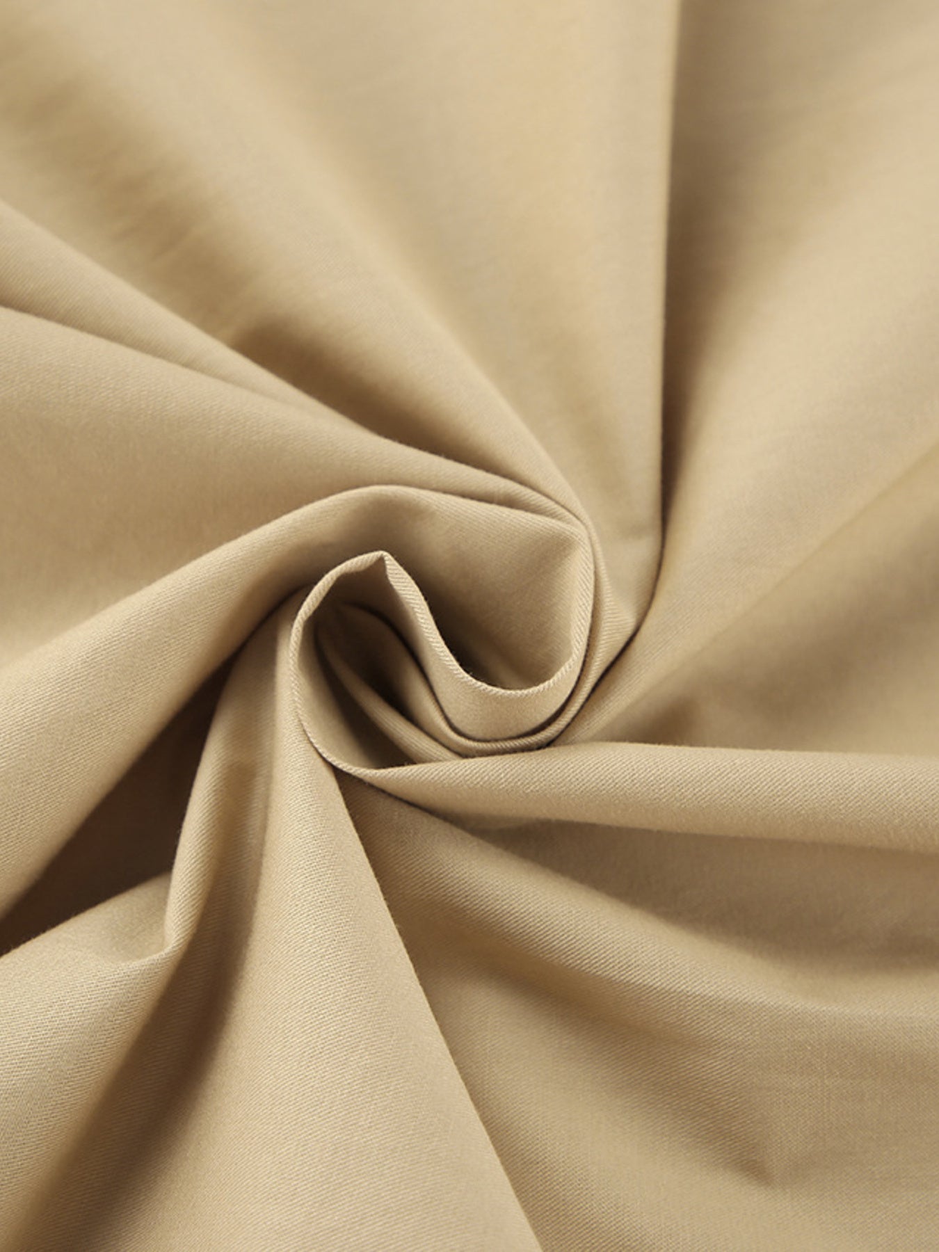 High-waisted A-line skirt in tan cotton fabric with subtle texture