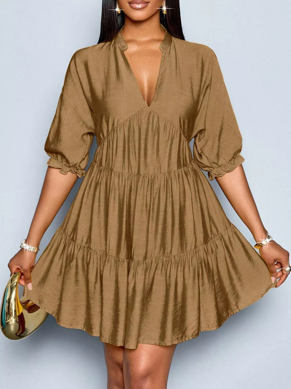Brown tiered mini dress with notched V-neck and puff sleeves
