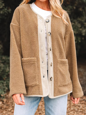 Plush corduroy patchwork jacket in camel with button front and patch pockets.