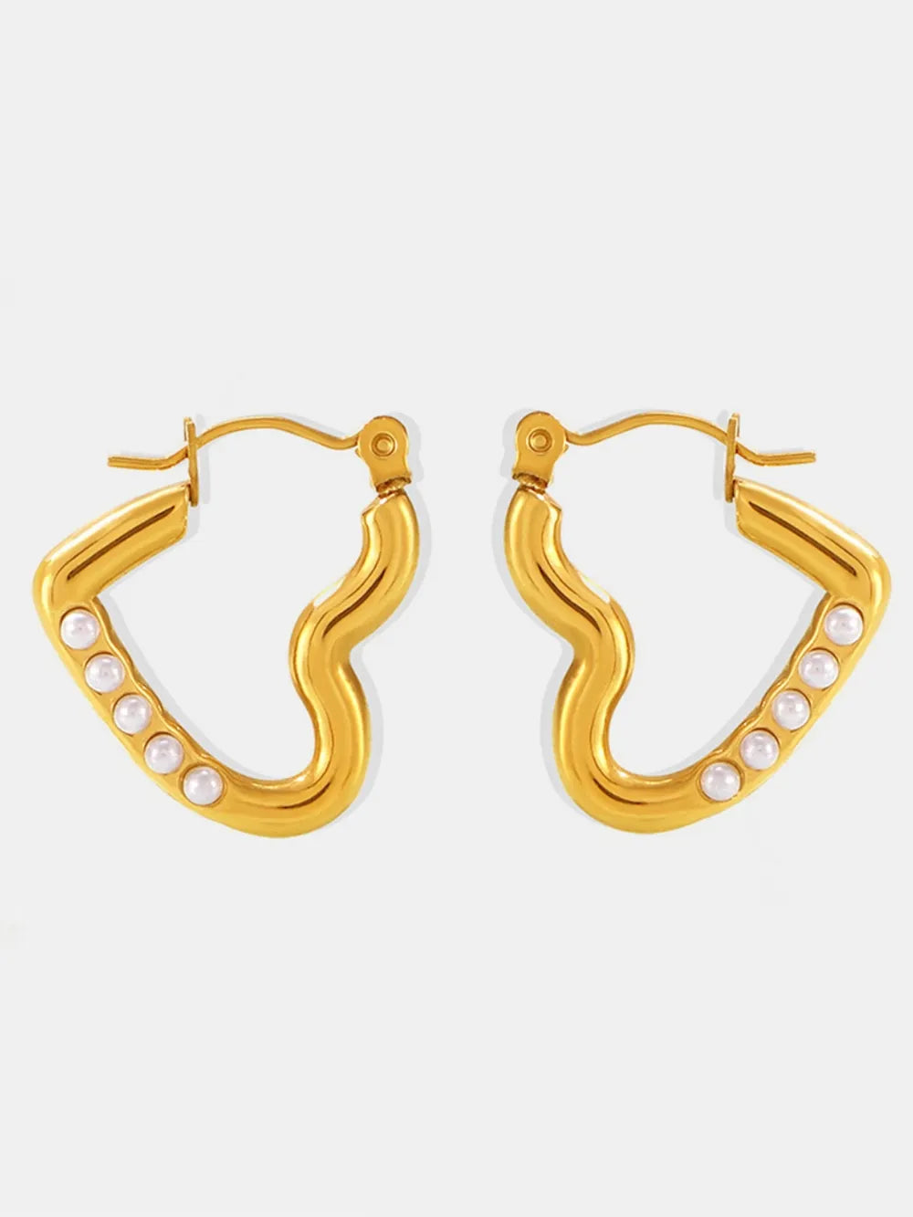 Gold wave hoop earrings with pearl accents
