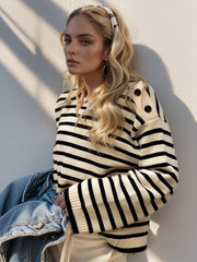 Nautical stripe sweater in cream and black with button shoulder detail.
