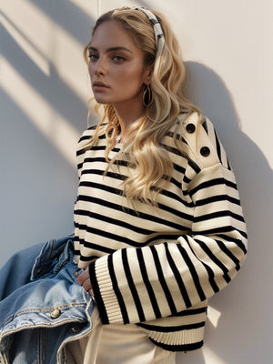 Nautical stripe sweater in cream and black with button shoulder detail.