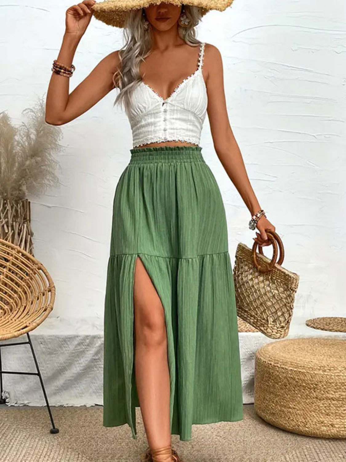 Textured tiered maxi skirt in matcha green with a high slit and smocked waist.