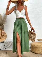 Textured tiered maxi skirt in matcha green with a high slit and smocked waist.