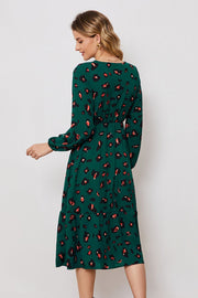 Emerald leopard print midi dress with balloon sleeves and tiered hem