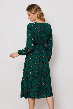 Emerald leopard print midi dress with balloon sleeves and tiered hem