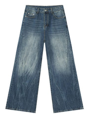 Electric Drift Wide Leg Jeans in Medium wash denim with distressed detailing and a relaxed fit.